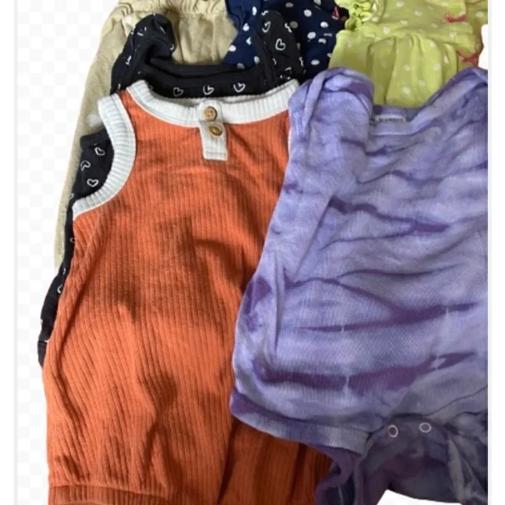 Lots of nine girls onesies sizes from 6 to 12 months